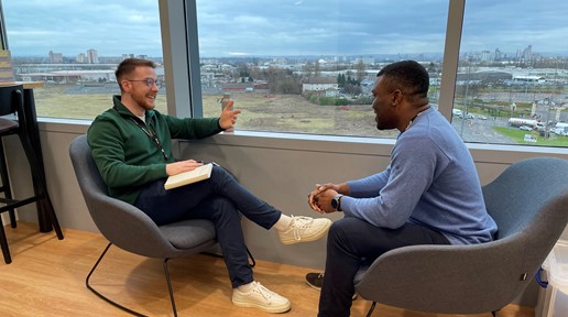 Andy and Tomi talking